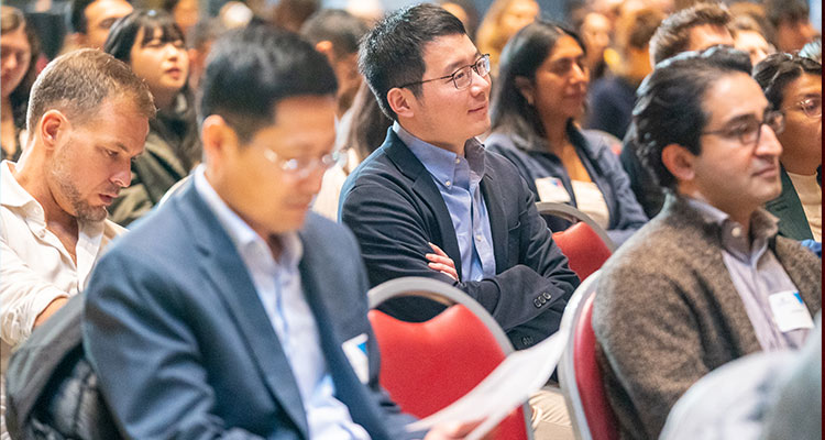 people in audience at conference